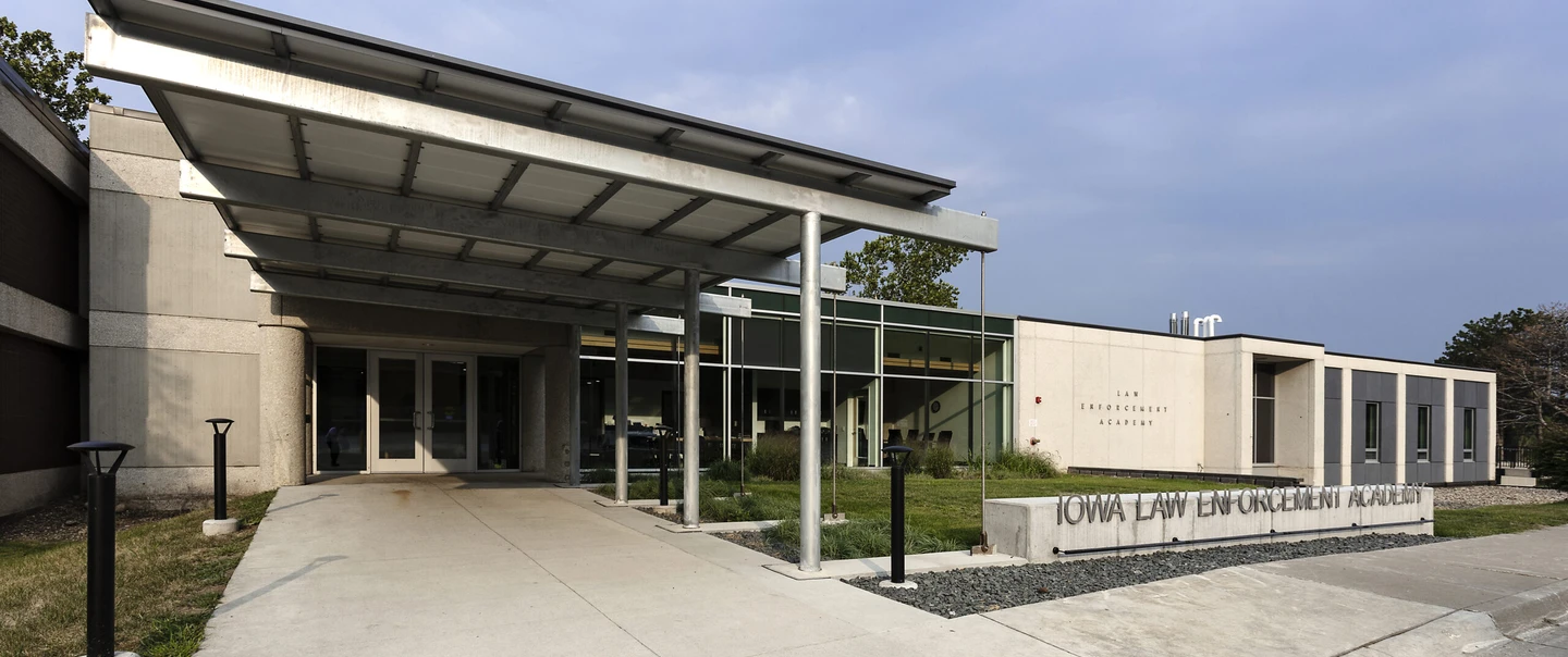 Exterior of a brick building with an overhang